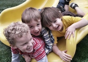Kids playing on a slide